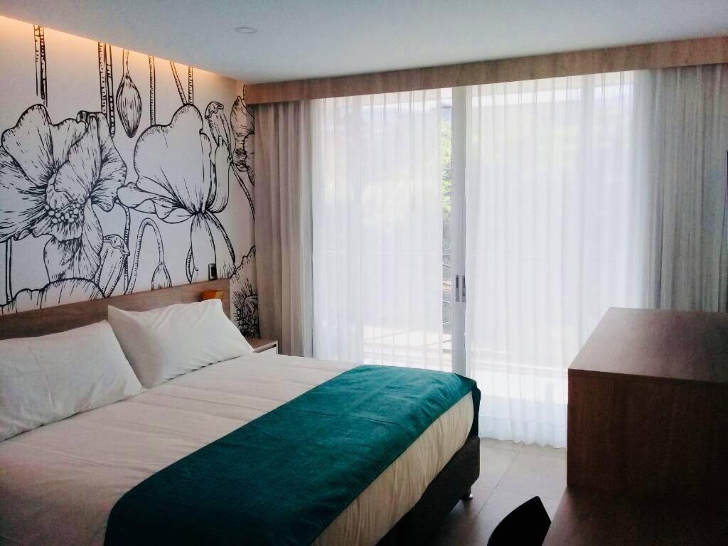 Hotel Karmel Melgar Extérieur photo